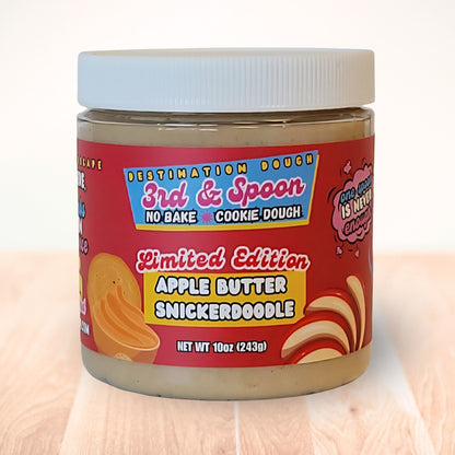 10 oz jar of 3rd & Spoon apple butter snickerdoodle edible cookie dough on a light wooden counter