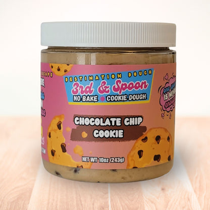10 oz jar of 3rd & Spoon chocolate chip edible cookie dough on a light wooden counter