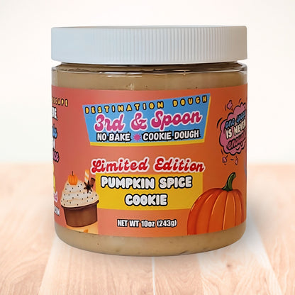 10 oz jar of 3rd & Spoon pumpkin spice cookie edible cookie dough on a light wooden counter