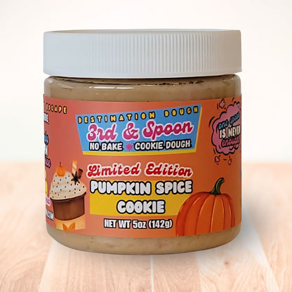 5 oz jar of 3rd & Spoon pumpkin spice cookie edible cookie dough on a light wooden counter